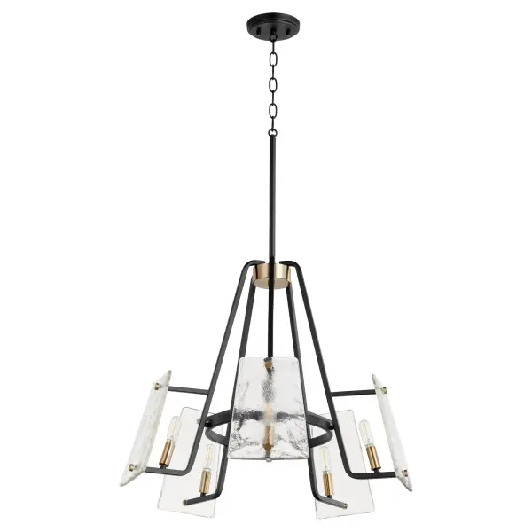 The Tioga chandelier masterfully blends Mid-Century Modern design with transitional appeal through its conical shape, linear framing, and frosted glass trapezoid shades. The Aged Brass-Noir finish combination creates nostalgic charm while maintaining contemporary minimalism.