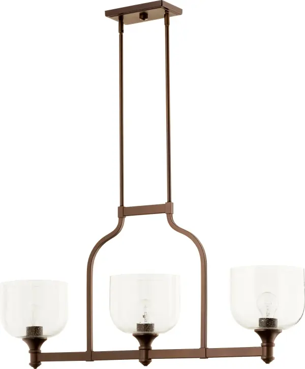 The Richmond Island Light combines traditional design with playful semicircular arms and clear seeded glass shades. Its oiled bronze finish and versatile styling make it perfect for kitchen islands and dining spaces.