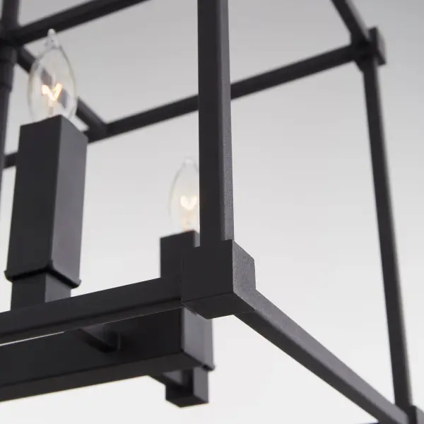 The Olympus linear pendant combines geometric sophistication with practical versatility. Its six-light design is perfect for kitchen islands and dining tables, while interchangeable candle sleeves in three finishes let you customize the look. - alternate view