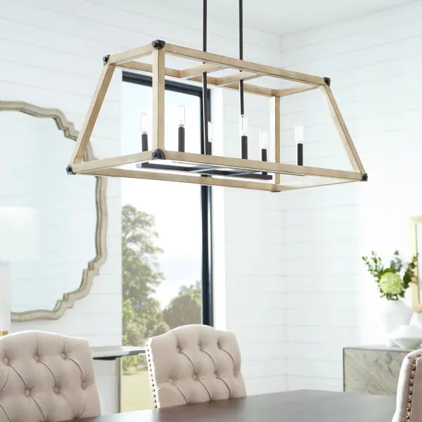 The Alpine chandelier combines farmhouse warmth with industrial edge through its two-tone Driftwood and Noir finish. Six exposed candelabra bulbs create ambient lighting within a linear open frame, perfect for rustic and transitional spaces. - alternate view