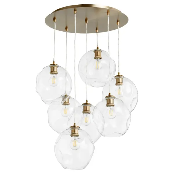 The Numen 7-Light Pendant Cluster combines modern sophistication with timeless brass warmth. Its multi-light cluster design creates visual interest while clear wavy glass globes provide beautiful light diffusion for dining and entertaining spaces.