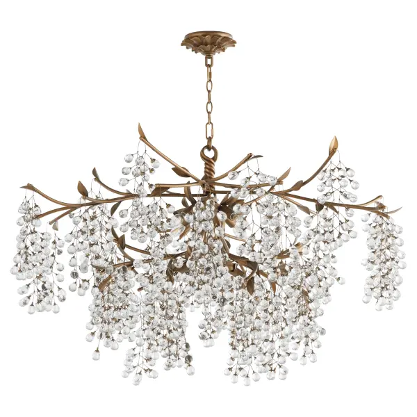 The Glicina chandelier brings Old World elegance with its organic grape-cluster crystal design and botanical details. Natural brass finish adds warmth while the oversized scale makes a dramatic statement in formal spaces.