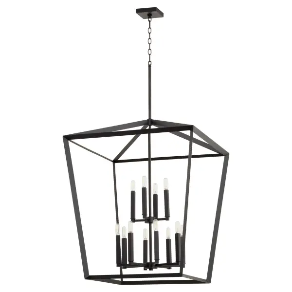 The Manor chandelier delivers impressive illumination with 12 lights in an open-frame design. Its noir black finish and interchangeable candle sleeves offer flexibility for various design schemes, from modern farmhouse to transitional spaces.