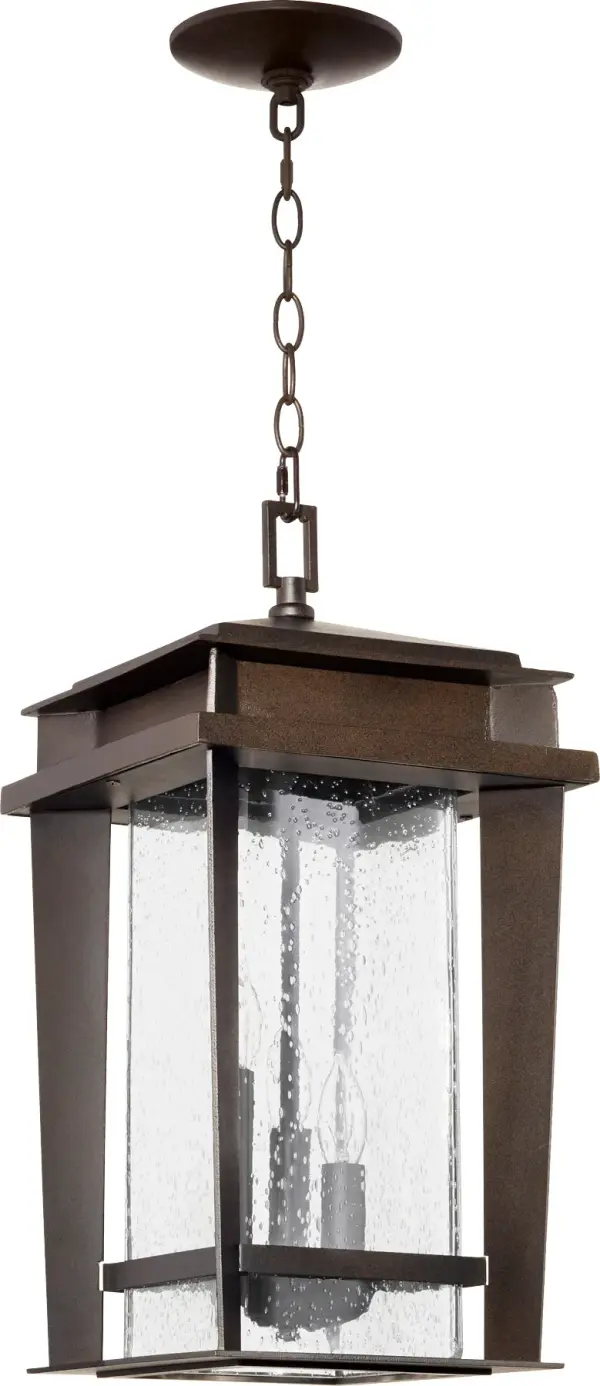 The Easton 3-Light Pendant combines clean mid-century lines with durable outdoor construction. Its oiled bronze finish and seeded glass create warm, inviting illumination for covered exterior spaces.
