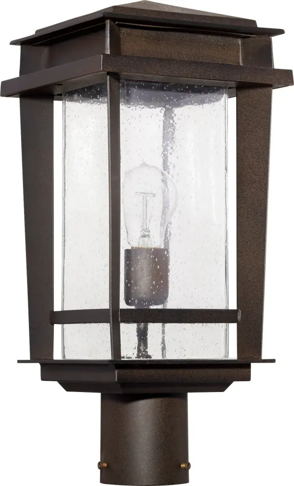 The Easton post lantern brings clean-lined mid-century modern style to your outdoor spaces. Its durable metal construction in Oiled Bronze finish paired with clear seeded glass creates visual interest while providing reliable illumination.