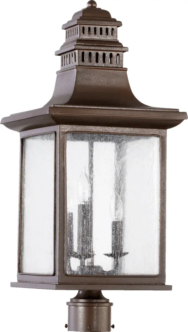 The Magnolia 3-Light Post Lantern combines traditional styling with durable outdoor construction. Its oiled bronze finish and clear glass panels provide warm, welcoming illumination for pathways and entryways.