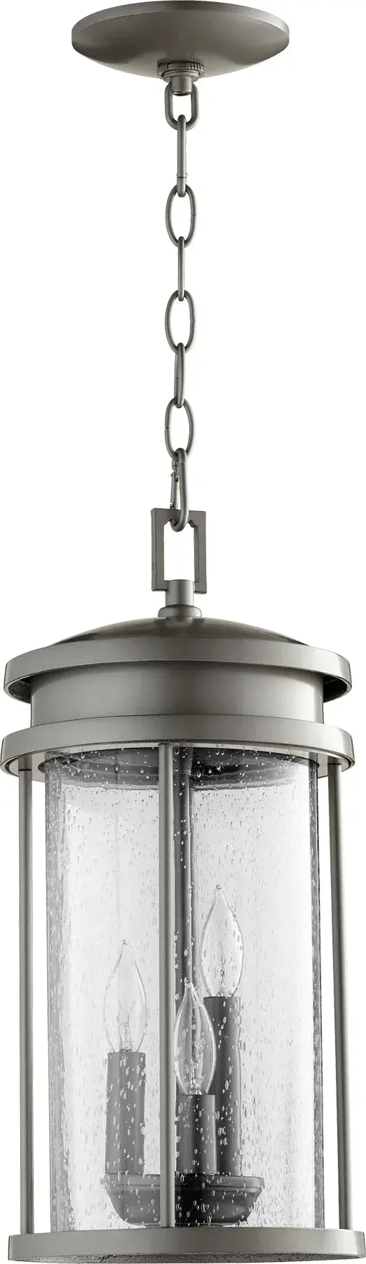 The Hadley pendant combines modern aesthetics with outdoor durability. Its elongated drum silhouette and clear seeded glass create beautiful ambient lighting while the wet-listed rating ensures reliable performance in exposed conditions.