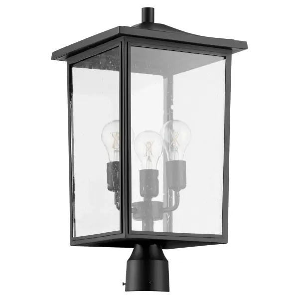 The Riverside post light brings timeless elegance to outdoor spaces with its transitional design and noir black finish. Four-pane clear seeded glass creates ambient warmth while wet-rated construction ensures durability.