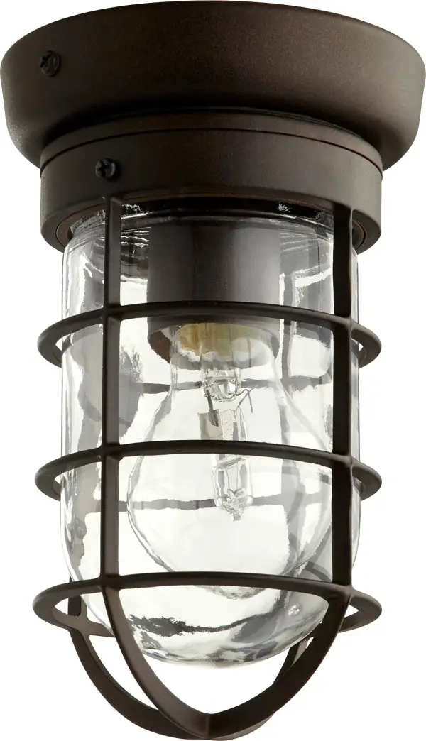 The Bowery ceiling mount combines rustic cage styling with coastal appeal, perfect for covered outdoor spaces. Its oiled bronze finish and clear glass deliver welcoming illumination while standing up to the elements.