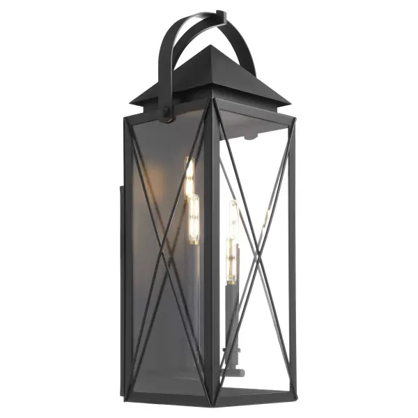 The Mystic 30" wall lantern combines traditional lantern styling with contemporary construction. Its rectangular frame, cross-brace detailing, and peaked roof create timeless curb appeal, while the matte black finish and clear glass panels ensure versatile compatibility with various architectural styles. - alternate view