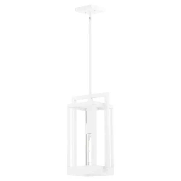 The Marco 18" pendant combines contemporary geometric design with marine-grade construction, making it ideal for outdoor spaces. Its interlocking rectangular framework in white finish adds architectural interest while standing up to the elements. - alternate view