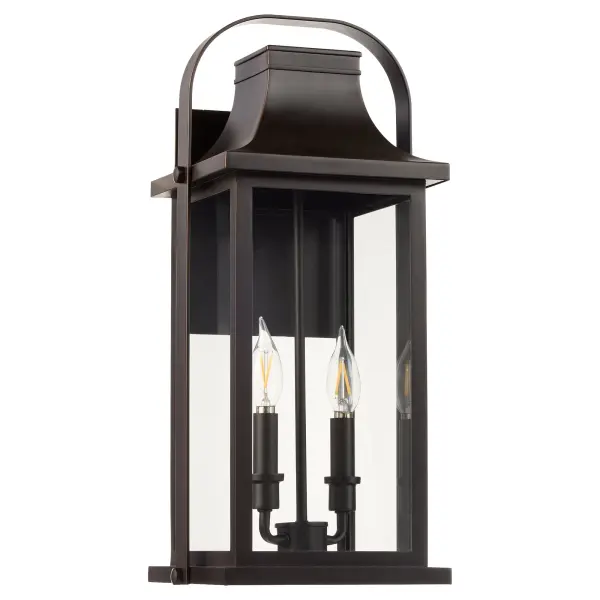 The Downey 20" wall lantern delivers authentic traditional style for outdoor spaces with its bronze finish and clean architectural lines. Perfect for homeowners seeking classic curb appeal and designers specifying timeless exterior lighting.