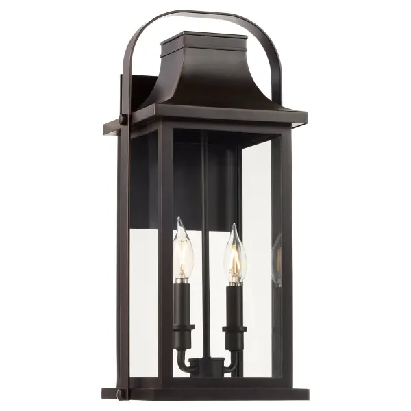 The Downey 20" wall lantern delivers authentic traditional style for outdoor spaces with its bronze finish and clean architectural lines. Perfect for homeowners seeking classic curb appeal and designers specifying timeless exterior lighting. - alternate view