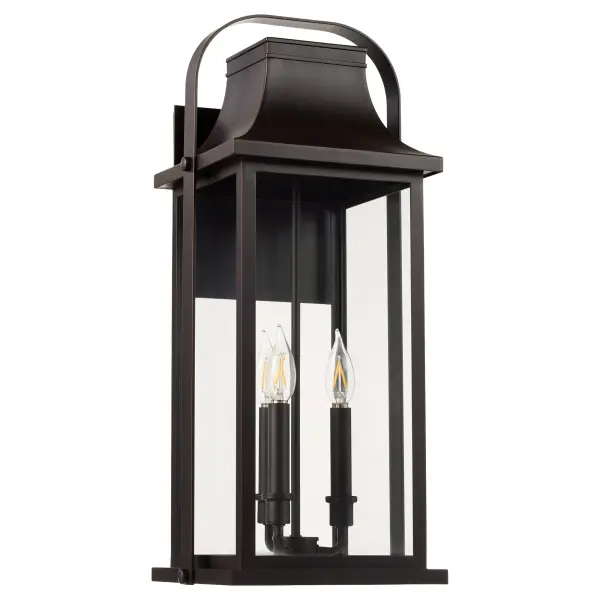 The Downey 23" lantern combines traditional styling with clean lines for a sophisticated outdoor lighting solution. Its bronze finish enhances curb appeal while providing ample illumination for entryways and exterior walls.