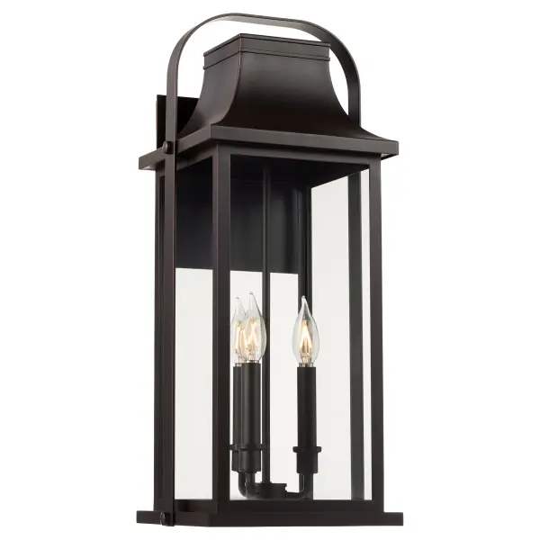The Downey 23" lantern combines traditional styling with clean lines for a sophisticated outdoor lighting solution. Its bronze finish enhances curb appeal while providing ample illumination for entryways and exterior walls. - alternate view