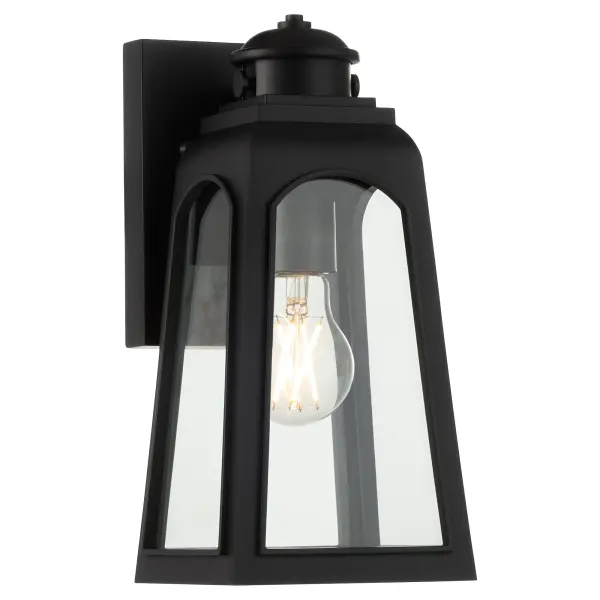 The Francis 12" lantern combines colonial charm with modern simplicity in a versatile matte black finish. Its compact size and clean lines make it ideal for flanking doorways or illuminating outdoor living spaces with understated elegance.