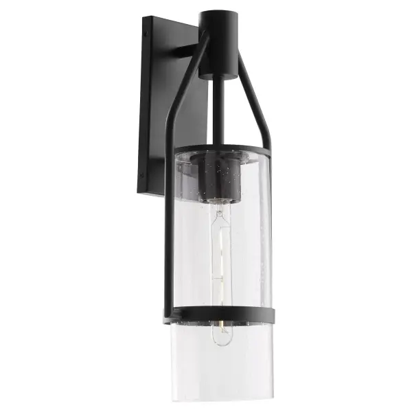 The Townshend lantern blends traditional lantern styling with modern geometric lines in a durable textured black finish. Its 21-inch scale and clear glass shade provide ample illumination while the slender steel frame adds contemporary sophistication to any exterior. - alternate view
