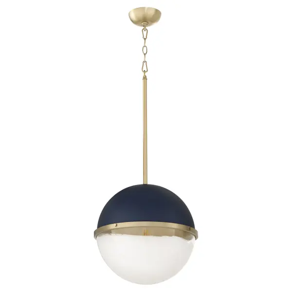 This 14-inch sphere pendant blends industrial charm with transitional elegance. The distinctive two-tone milk glass shade features a blue cap and decorative capture ring with vintage screws, suspended from an aged brass chain.