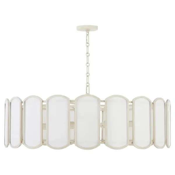 The Belleview 8-light pendant from Tamara Day's collection combines farmhouse warmth with artisanal sophistication. Rectangular Tiffany glass panels framed in washed oak create dramatic visual impact, while the signature clover finial adds designer detail.
