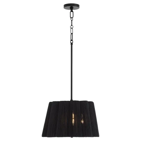 The Anton pendant beautifully balances organic warmth with contemporary design through its natural fiber-wrapped scalloped drum shade and sleek Figaro chain. The three-light configuration provides ample illumination while the textured shade creates a soft, diffused glow perfect for intimate spaces. - alternate view