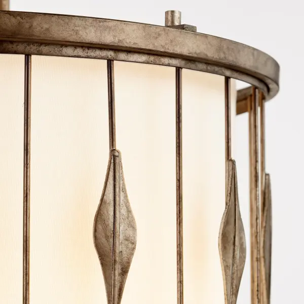 The Cordon pendant combines sophisticated traditional styling with practical functionality. Its open frame design features ornate leaf accents and a star-like silhouette, while the fabric shade and acrylic diffuser ensure even, spot-free lighting. Damp-rated for versatility. - alternate view