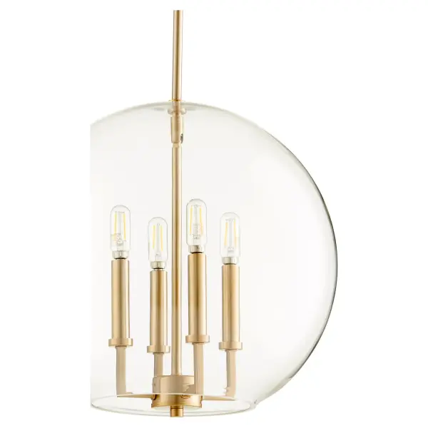 This transitional globe pendant combines classic styling with modern versatility. The clear glass bowl and aged brass finish create a sophisticated look that works indoors or in covered outdoor spaces. - alternate view