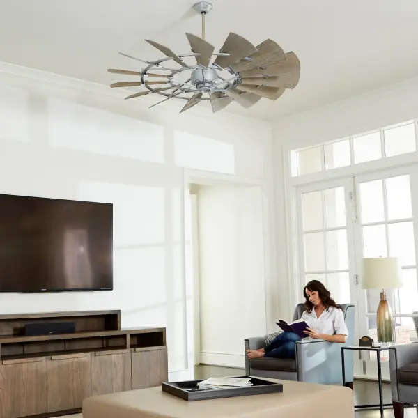 The Windmill ceiling fan makes a bold architectural statement with its wagon wheel blade design inspired by classic farm windmills. Featuring a powerful 6-speed DC motor delivering 3472 CFM and remote control convenience. - alternate view
