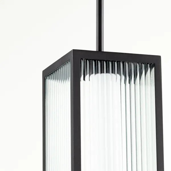 The Maestro pendant combines contemporary design with efficient LED technology. Its layered glass design—frosted shade within clear fluted exterior—creates visual depth while the noir finish adds sophistication. - alternate view