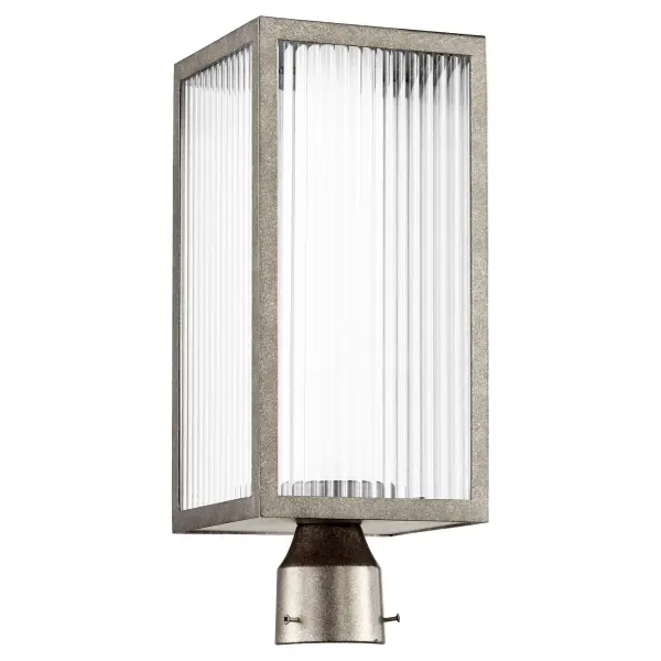 The Maestro post lantern delivers contemporary outdoor lighting with energy-efficient LED technology. Its distinctive boxed design features frosted glass within clear fluted glass, creating visual depth and modern appeal for covered outdoor spaces.