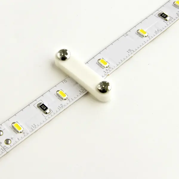 This 10-pack of mounting clips provides secure, professional installation for LED tape lighting. Each clip includes two screws for reliable attachment to various surfaces, ideal for under-cabinet and cove lighting projects.