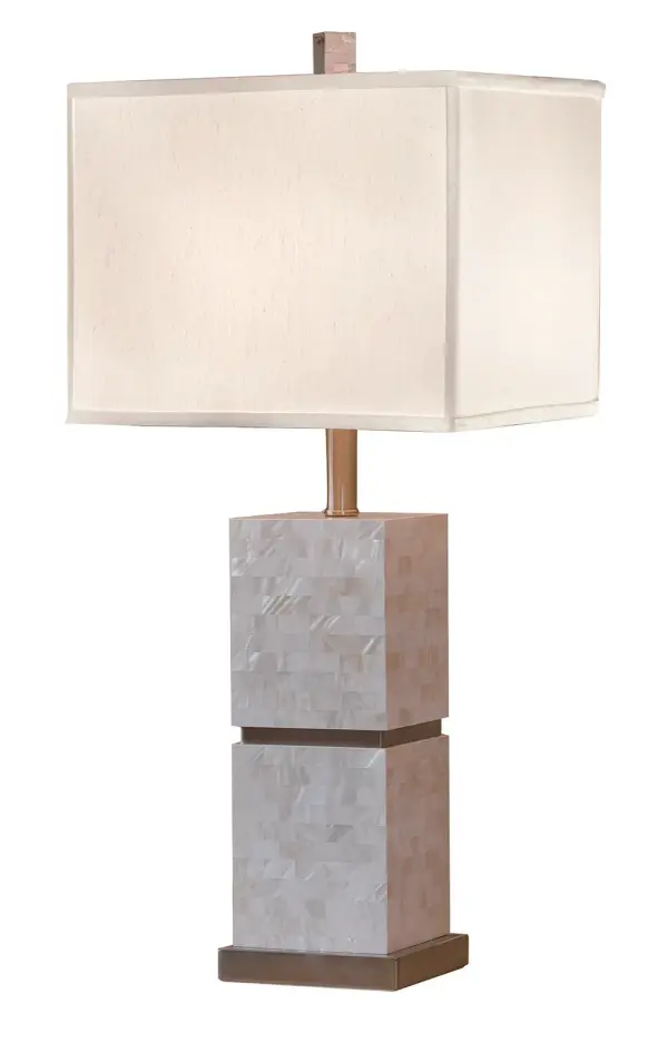 The Seaside table lamp brings organic coastal elegance with its mother of pearl body and brushed nickel accents. The 13-inch square silk shade provides soft, diffused light while the natural shell material adds texture and visual interest.