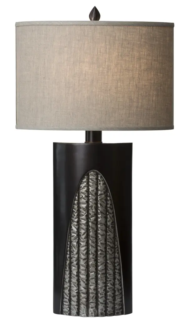 The Troy table lamp combines substantial cast metal construction with refined detailing. Its oil-rubbed bronze finish accented with brushed nickel creates visual interest, while the natural linen shade provides warm, diffused light.