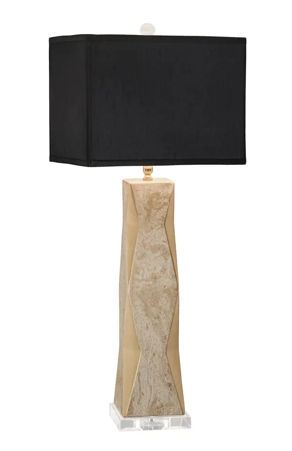 This statement table lamp features hand-crafted ceramic construction with a distinctive marbled gold finish and hand-painted brushed gold details. The geometric form paired with a crisp black rectangle shade creates sophisticated contrast.