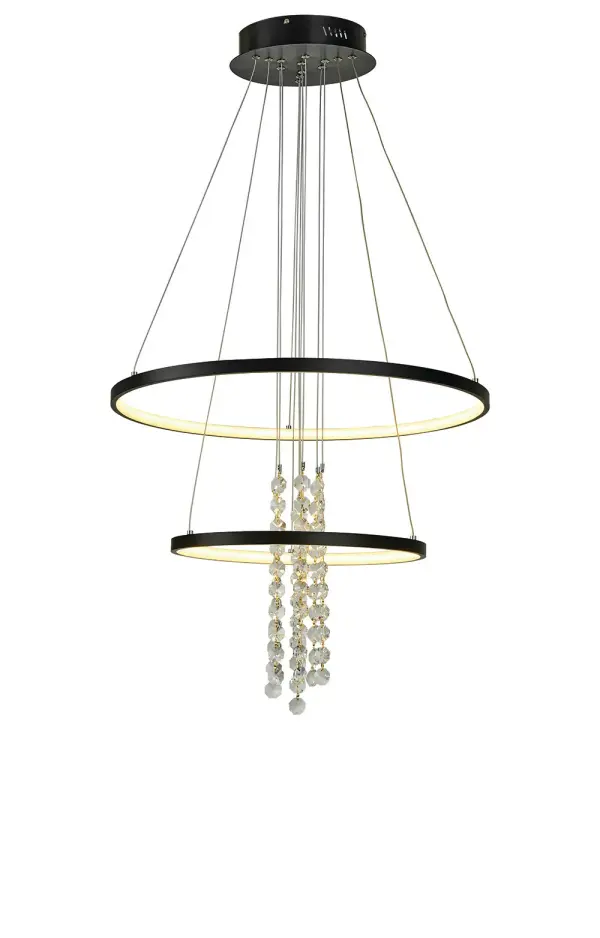 The Glacier chandelier combines contemporary black metal rings with cascading crystal elements for dramatic visual impact. Integrated LED technology delivers exceptional brightness and energy efficiency with adjustable installation height.