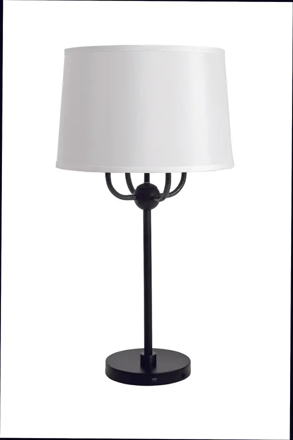 The Alpine table lamp features a dramatic 4-light cluster configuration with contrasting black and hammered silver finishes. At nearly 30 inches tall, it makes a bold statement while the white linen shade softens the industrial aesthetic.
