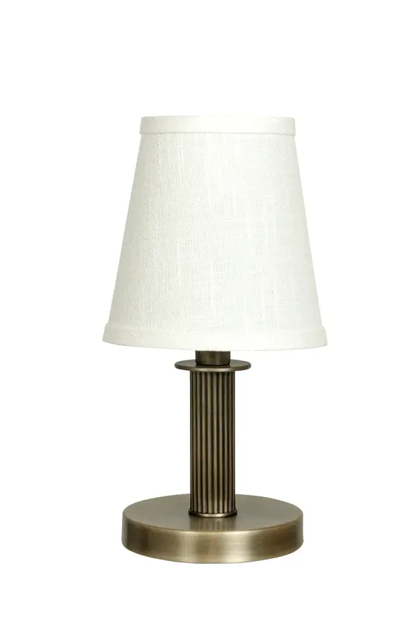 The Bryson Mini combines timeless traditional styling with compact proportions. Its reeded column base in warm antique brass finish and natural linen shade create sophisticated ambient lighting for intimate spaces.
