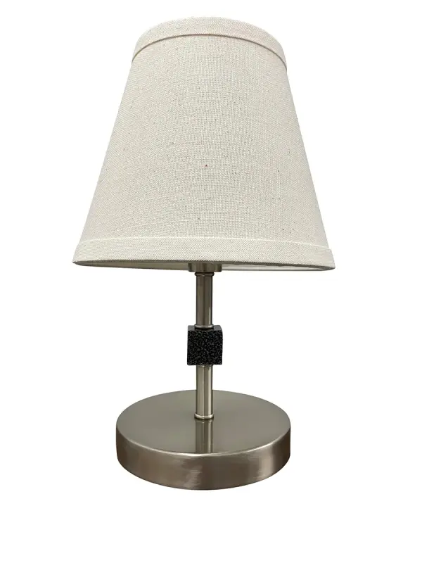 The Bryson Mini delivers sophisticated style in a petite 12-inch profile. Its dual-tone satin nickel and supreme silver finish adds visual interest, while the white linen shade provides warm, diffused light ideal for reading or ambiance.