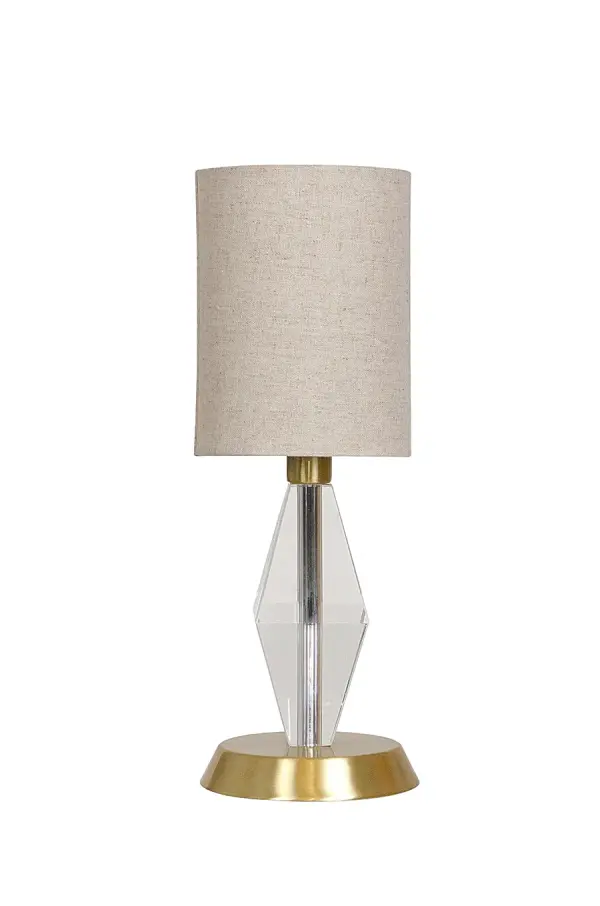 The Bryson Mini combines sophisticated crystal detailing with a tapered column design in warm satin brass. At just 13.5" tall, this compact accent lamp delivers refined elegance without overwhelming smaller spaces.