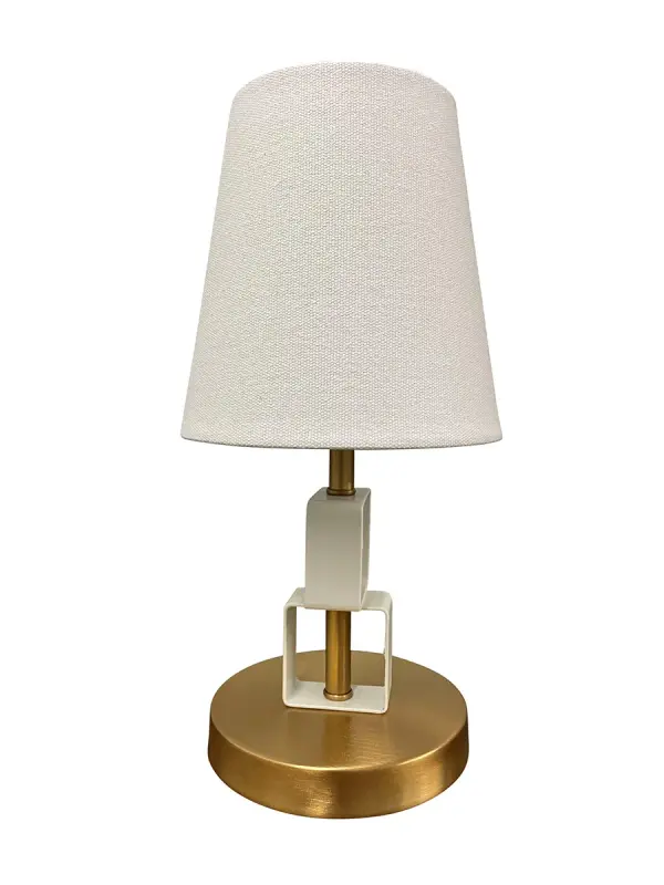 The Bryson Mini brings sophisticated style to small spaces with its weathered brass finish and classic linen shade. At just under 13" tall, this petite accent lamp delivers warm ambient lighting perfect for nightstands, side tables, or console styling.