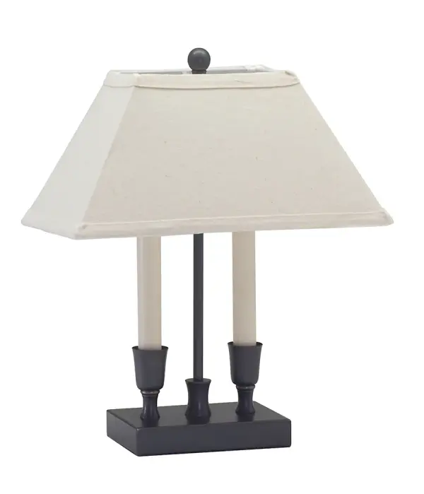 The Coach Mini Lamp delivers traditional elegance in a compact 15-inch profile. Its oil rubbed bronze finish and linen shade create warm ambient lighting perfect for intimate spaces and accent surfaces.