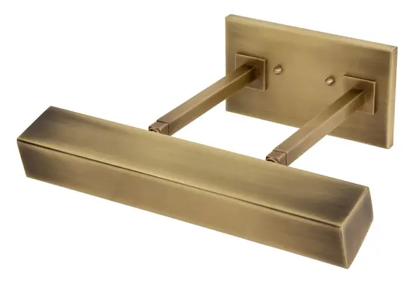 The Guilford LED Picture Light combines traditional styling with modern LED efficiency. Its 14-inch width and warm antique brass finish make it ideal for illuminating artwork, while the integrated 2700K LED provides museum-quality lighting.