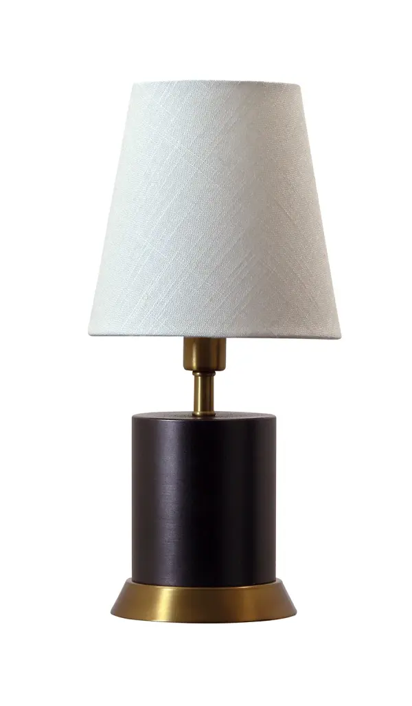 The Geo Cylinder Mini Accent Lamp combines contemporary geometric design with warm metallic finishes. At 12" tall, it's perfectly sized for intimate spaces, offering focused task lighting with decorative appeal.