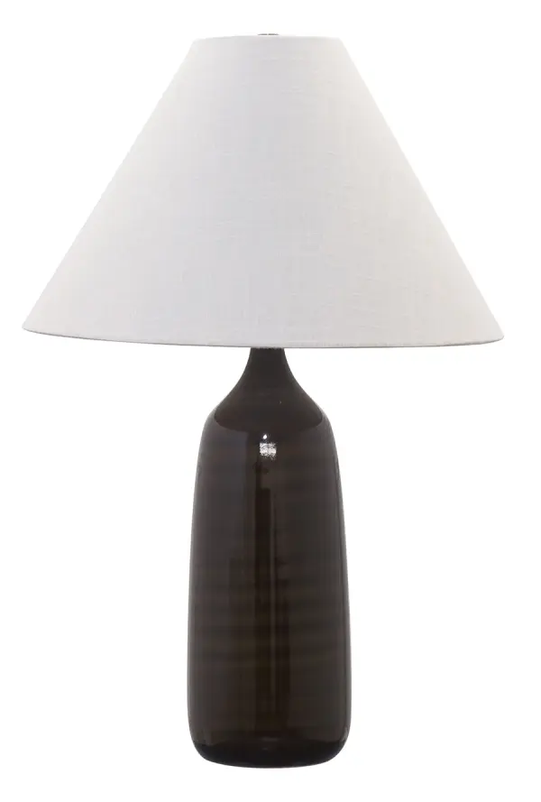 The Scatchard table lamp combines artisanal ceramic craftsmanship with a rich brown gloss finish. At 25" tall with a generous cream linen shade, it provides substantial presence and warm ambient lighting for living spaces.