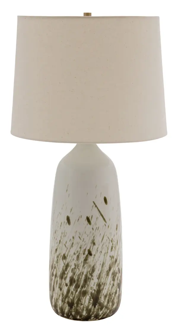 The Scatchard brings substantial presence at 31" tall with handcrafted ceramic construction and a glossy white finish. Its generous proportions and cream linen shade deliver both ambient lighting and decorative impact.