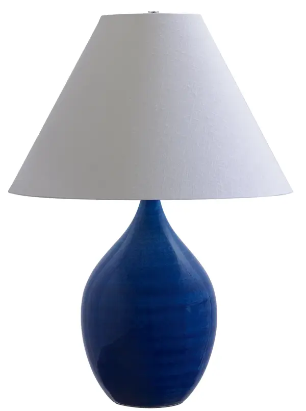 The Scatchard brings artisanal ceramic craftsmanship to traditional table lamp design. Its glossy blue stoneware base and generous 28-inch height make it ideal for living rooms and bedrooms needing substantial lighting presence.