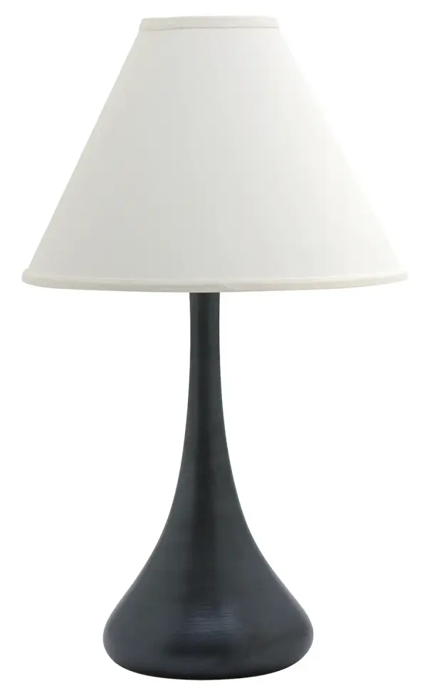 The Scatchard table lamp combines traditional ceramic craftsmanship with a modern matte black finish. At 26" tall with a generous 17" shade, it provides substantial presence and ambient lighting for living spaces and bedrooms.