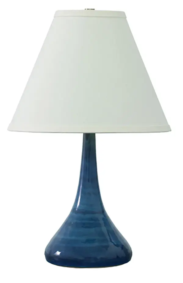 The Scatchard table lamp combines timeless stoneware craftsmanship with a vibrant blue gloss finish. At 19" tall with a 12" diameter base, it provides substantial presence while remaining versatile for various room settings.