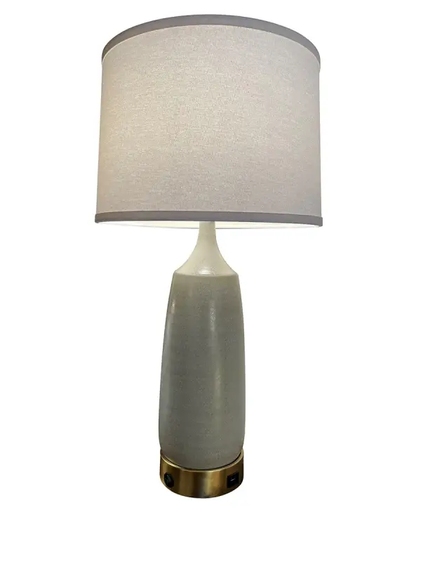 The Scatchard Table Lamp combines timeless stoneware styling with contemporary functionality. Its sand finish and clean lines work beautifully in transitional spaces, while the integrated USB base adds modern convenience.