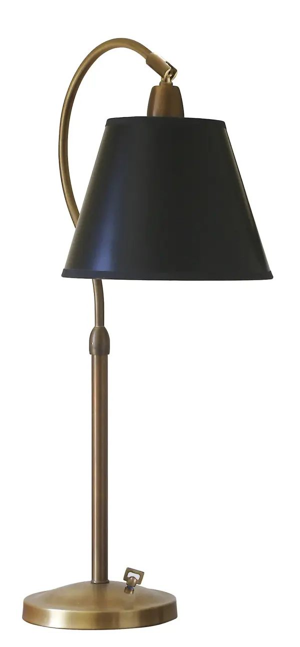 The Hyde Park table lamp combines traditional styling with modern functionality. Its weathered brass finish and black parchment shade create sophisticated ambiance, while the full-range dimmer offers precise lighting control.