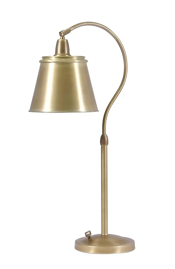 The Hyde Park table lamp combines traditional brass styling with modern functionality. Its weathered brass finish and metal shade create a sophisticated look, while the full-range dimmer provides precise light control for reading and task work.
